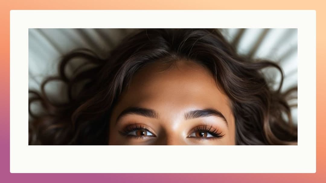 Hazel eyes looking up from bed