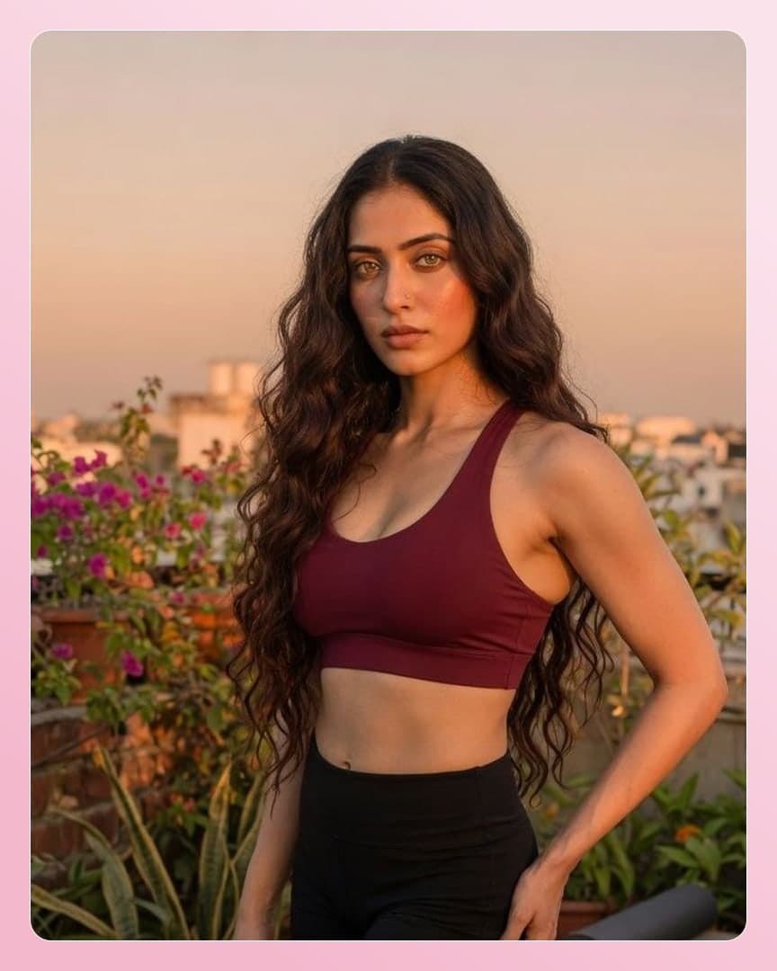 Rooftop sunset sports bra pose