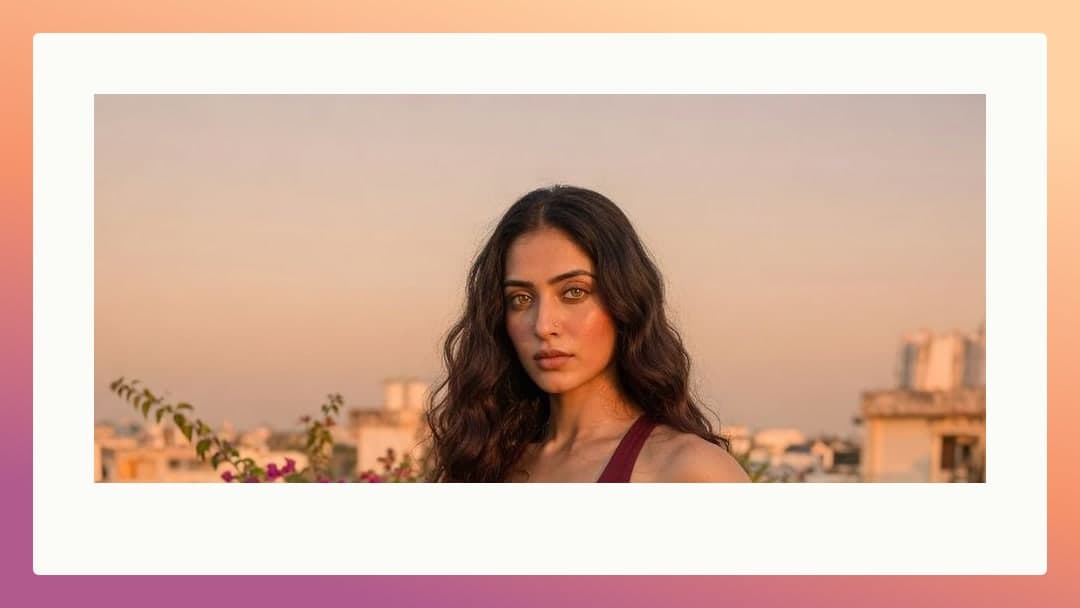 Rooftop sunset in maroon top