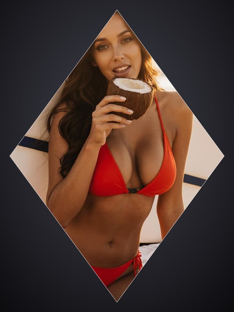 Young adult latina coconut selfie