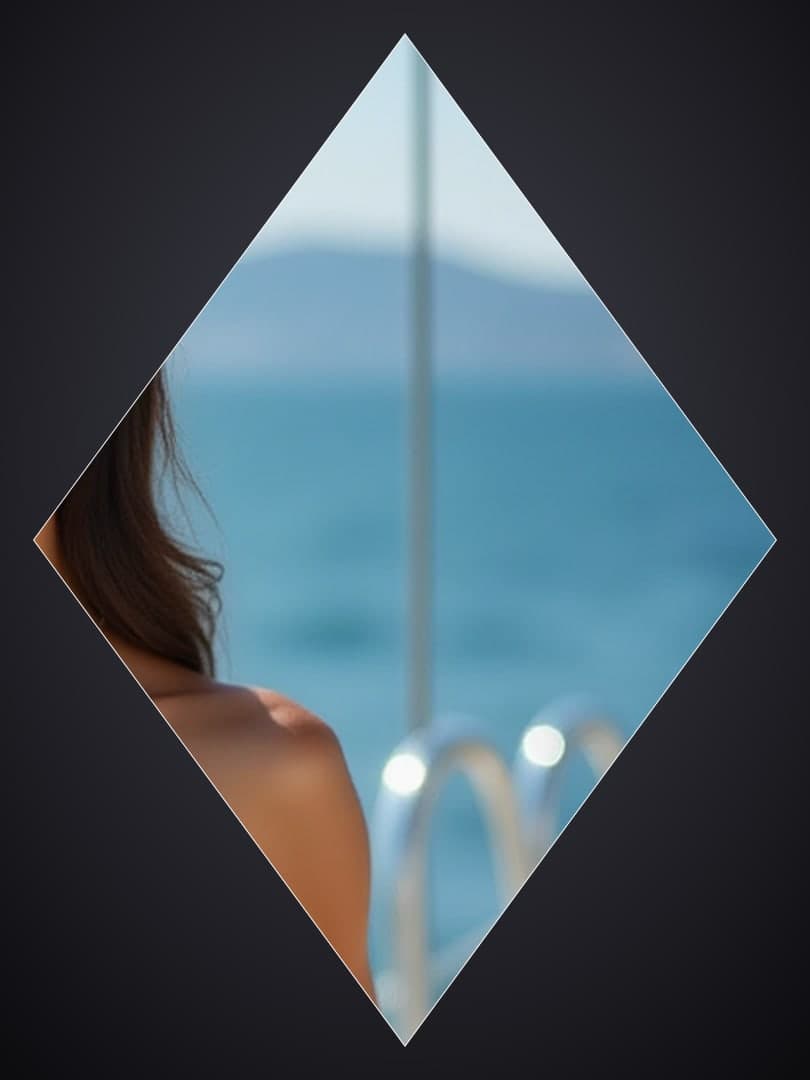 Brunette topless at ocean window