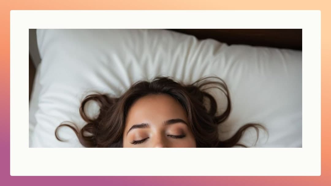 Brunette lies back on white pillows