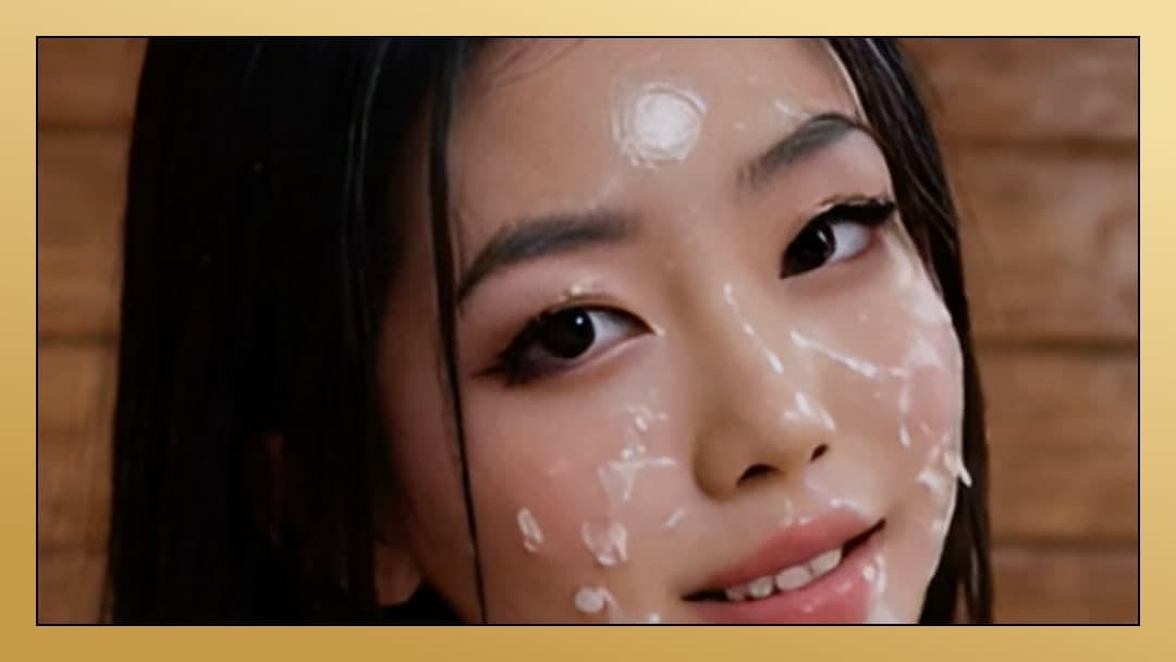 Young Asian facial close-up in bedroom