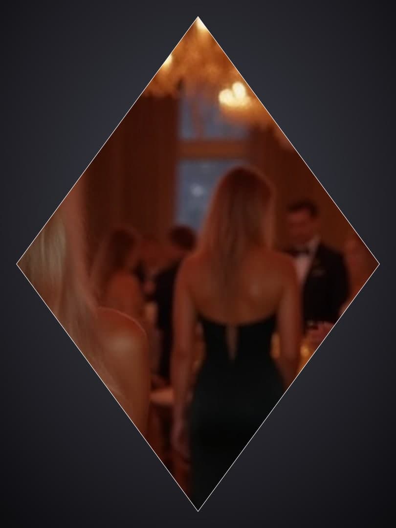 Backless black dress at formal event