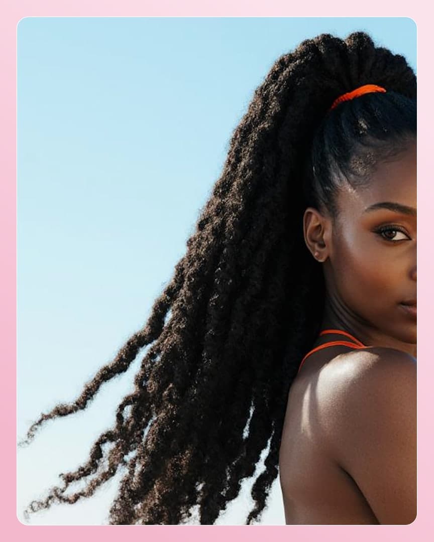 Young adult ebony shoulder glance