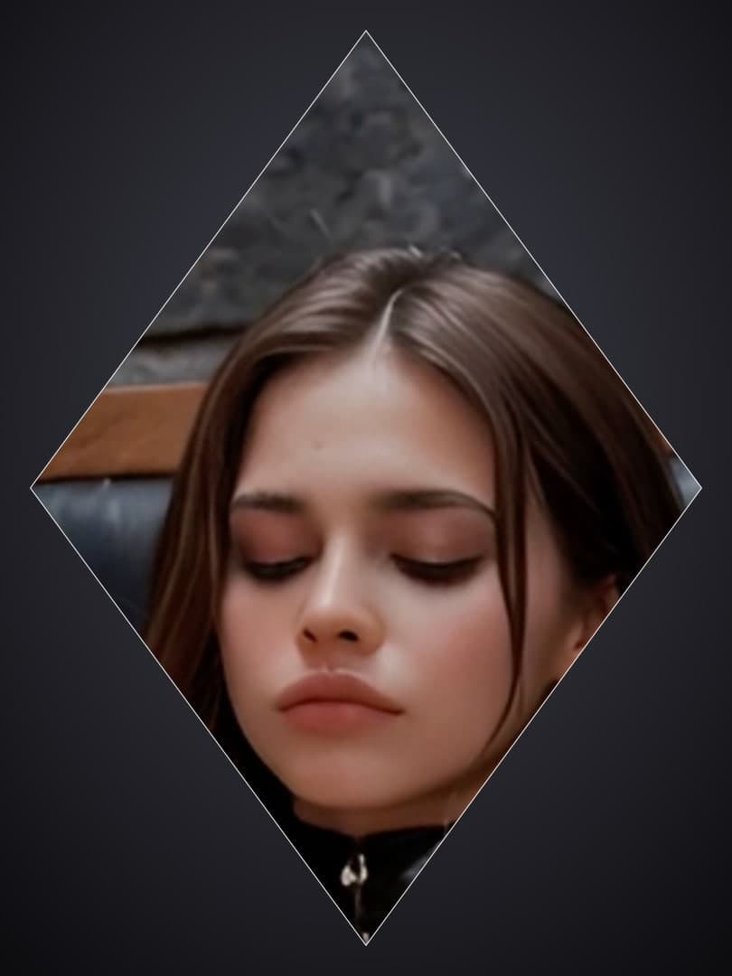 Brunette closed eyes portrait in black zip top