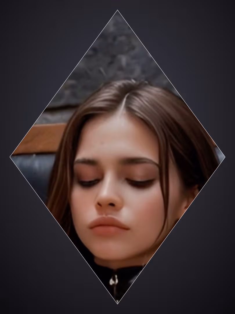Brunette closed eyes portrait in black zip top