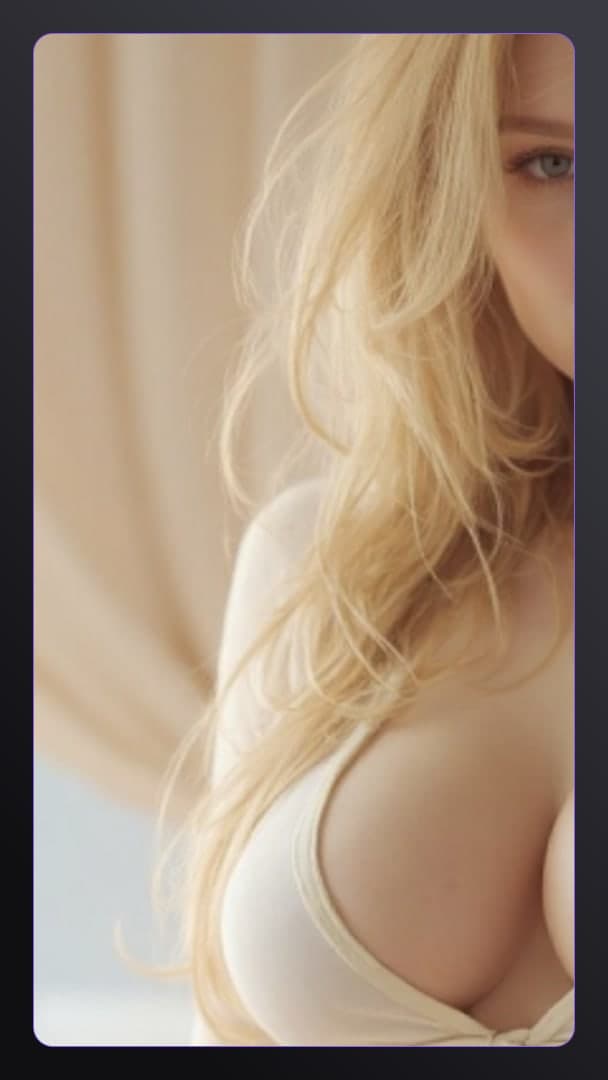 Curvy blonde cleavage in bedroom light