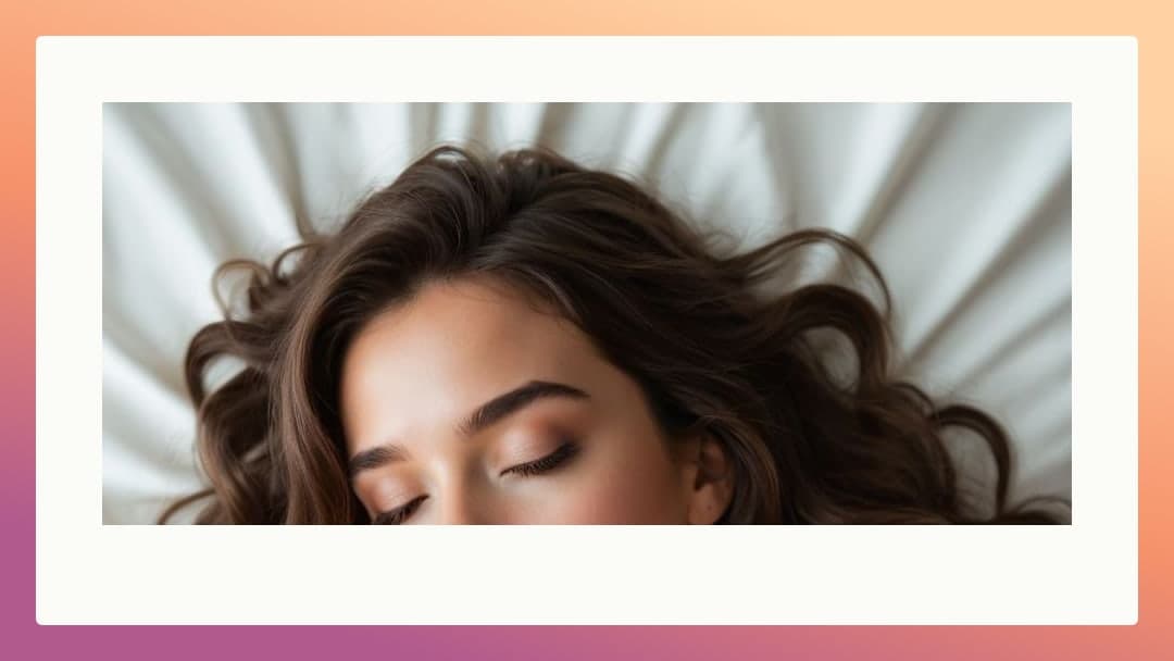 Long wavy brown hair on white sheets