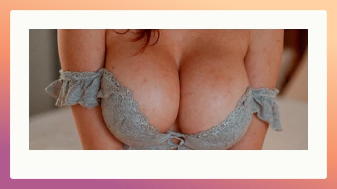 Curvy redhead big natural tits spilling