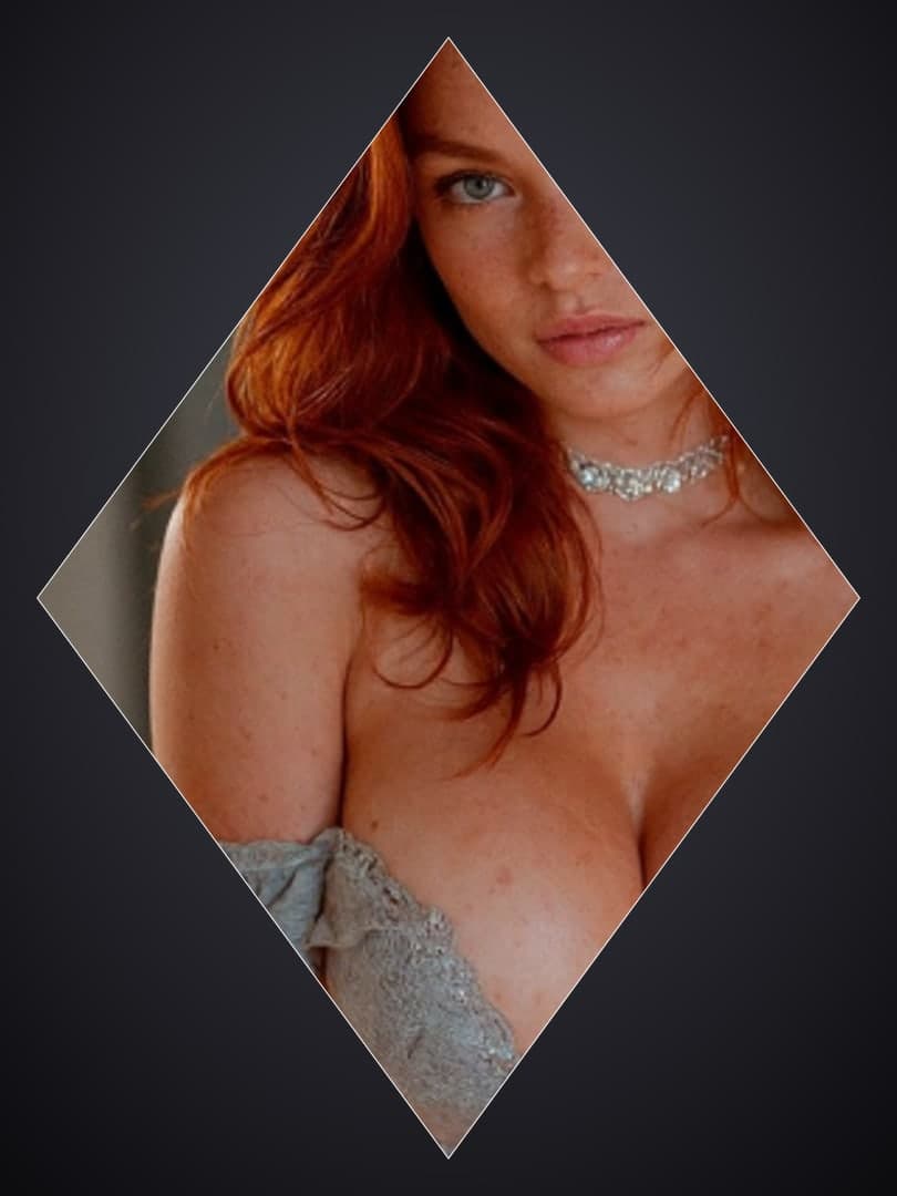 Redhead blue eyes in jeweled choker