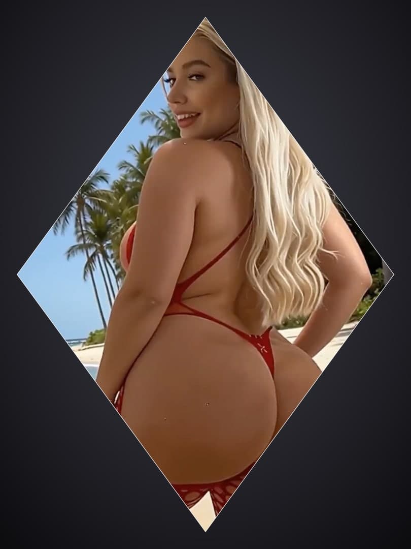 Low angle beach rear view red bikini