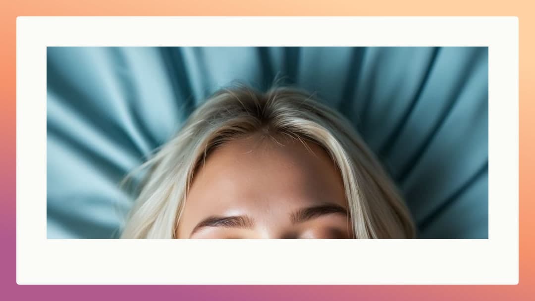 Blonde on teal sheets closeup