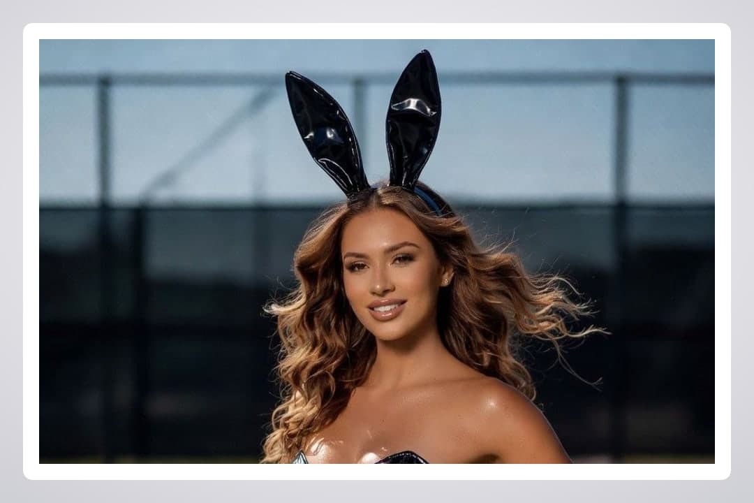 Brunette in glossy bunny ears