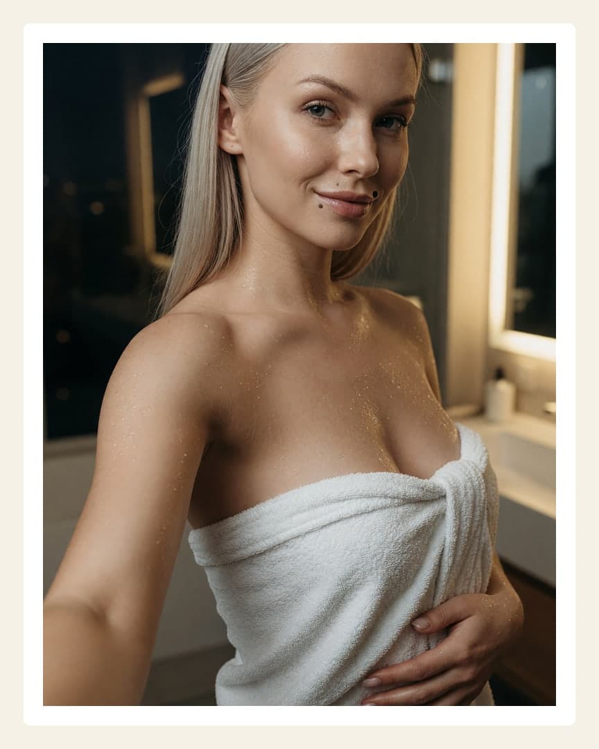 Platinum blonde in towel selfie