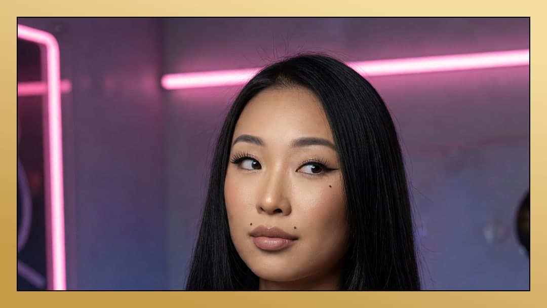 Asian close-up under pink neon