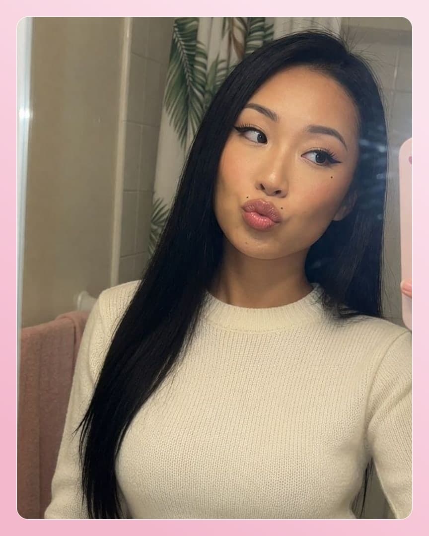 Curvy Asian busty sweater selfie