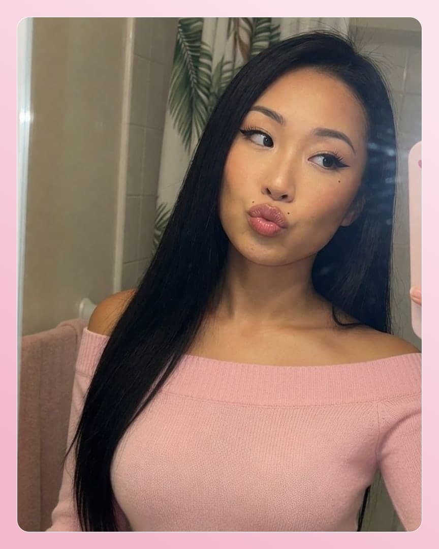 Bathroom mirror selfie in pink