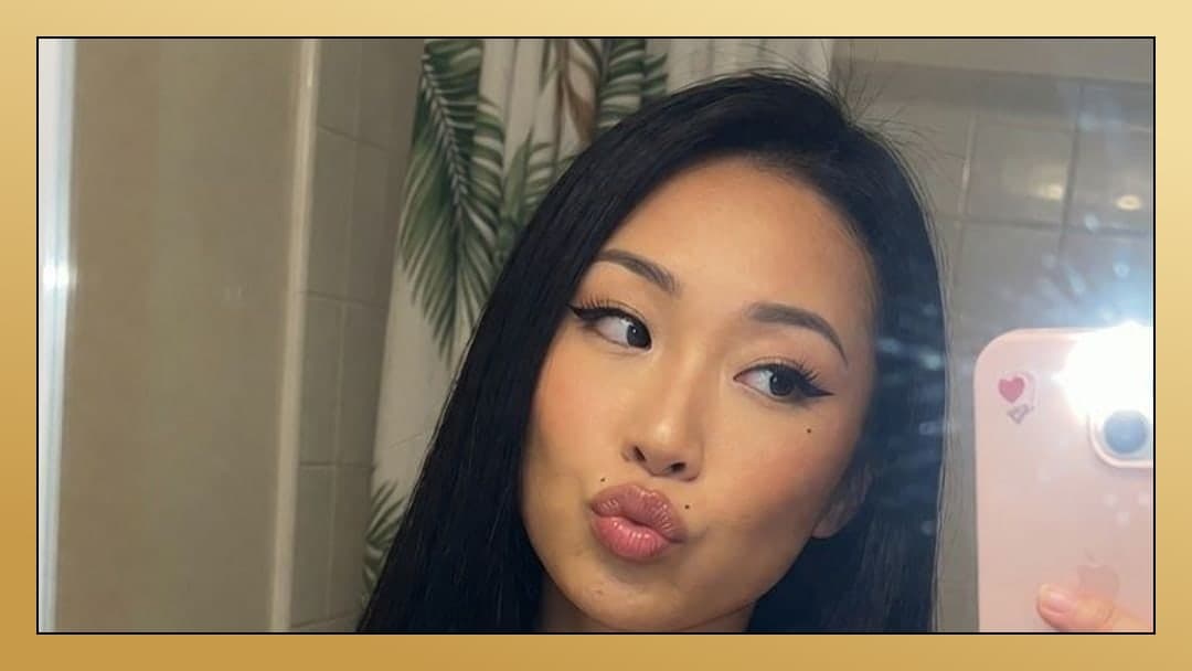 Young adult Asian topless selfie