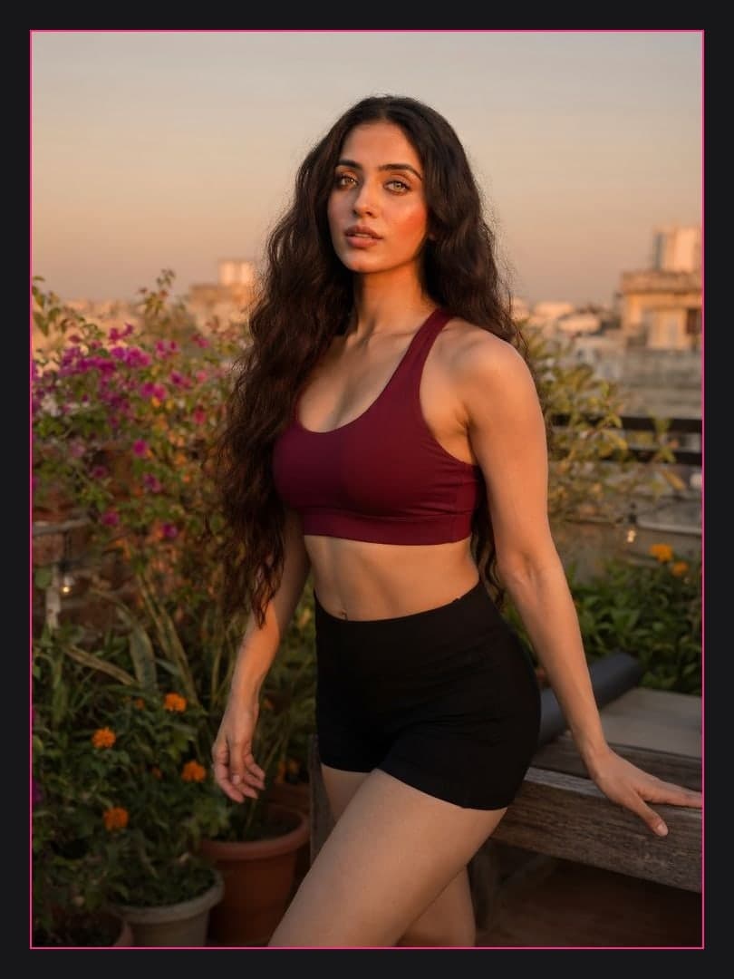 Young adult ebony rooftop sunset portrait