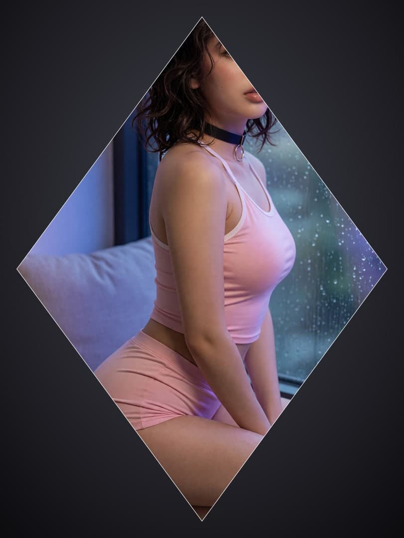 Pink tank top profile on bed