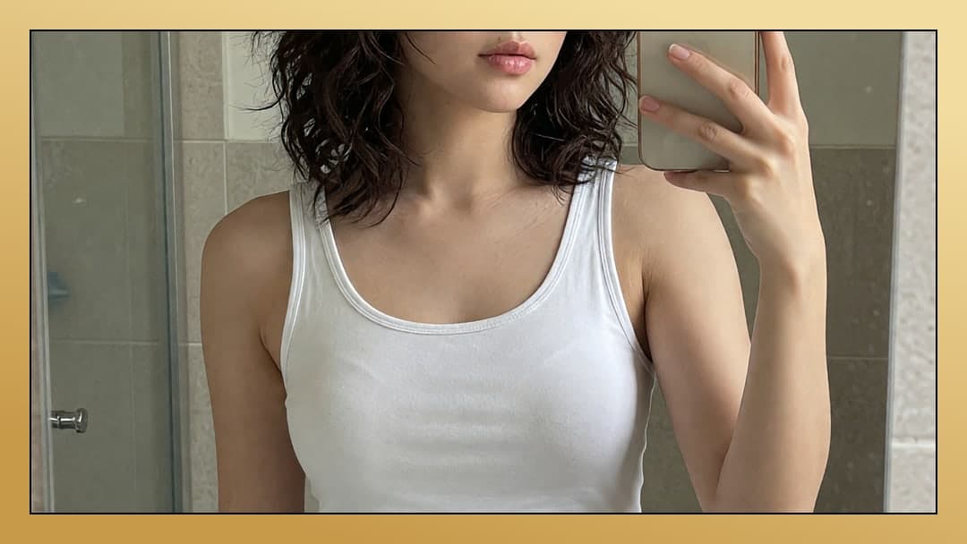 Slim curves in tight white tank