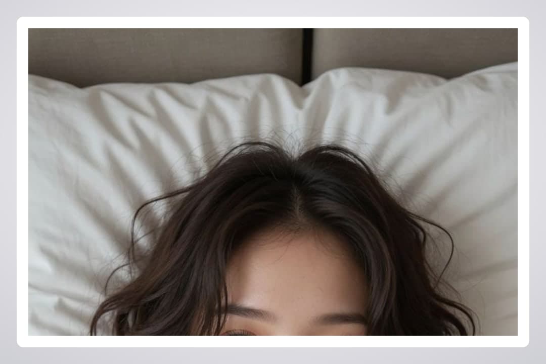 Slim Asian waist-up in bed