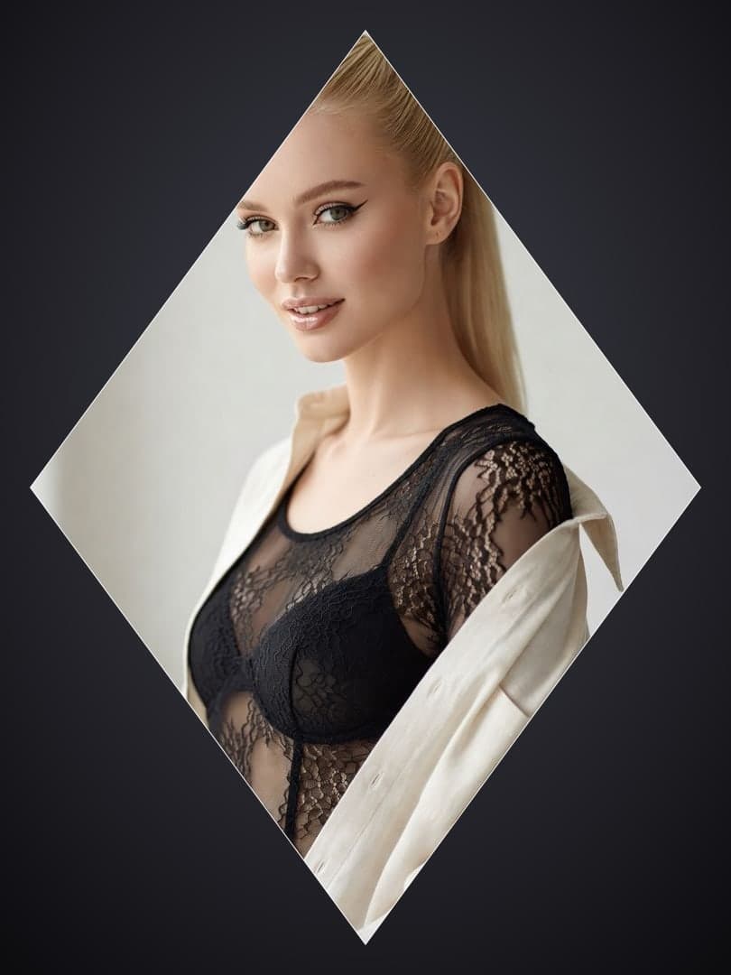 Sheer lace bodysuit over shoulder