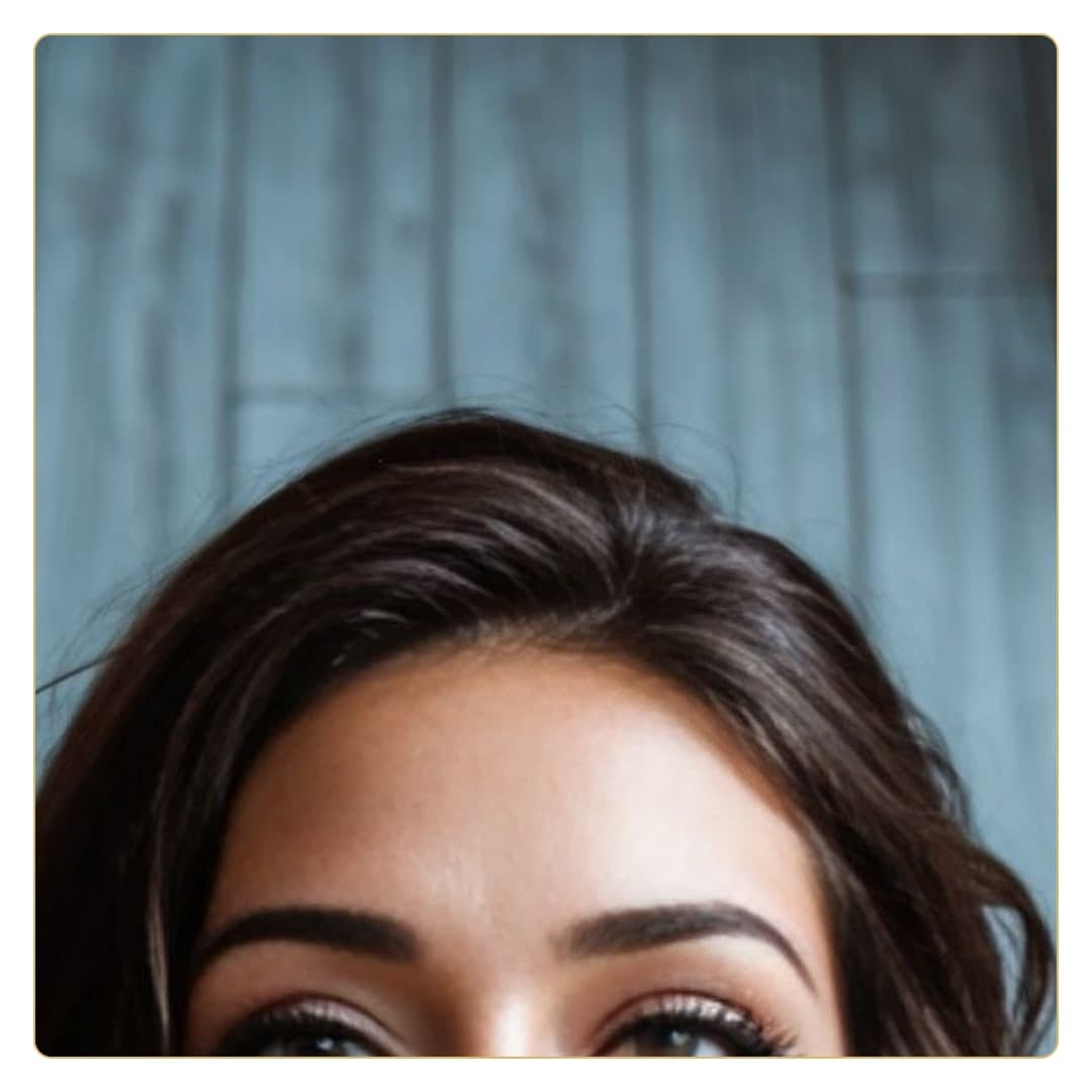 Close-up portrait against blue wall