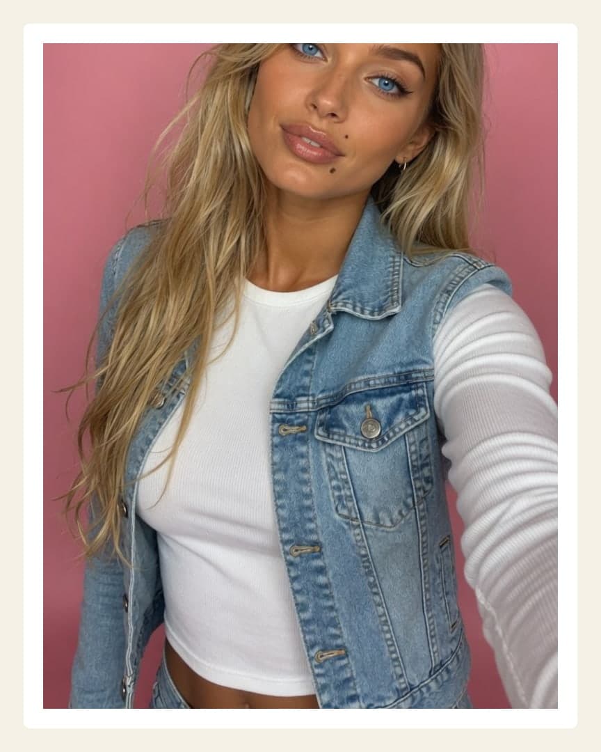 Blonde selfie pink background