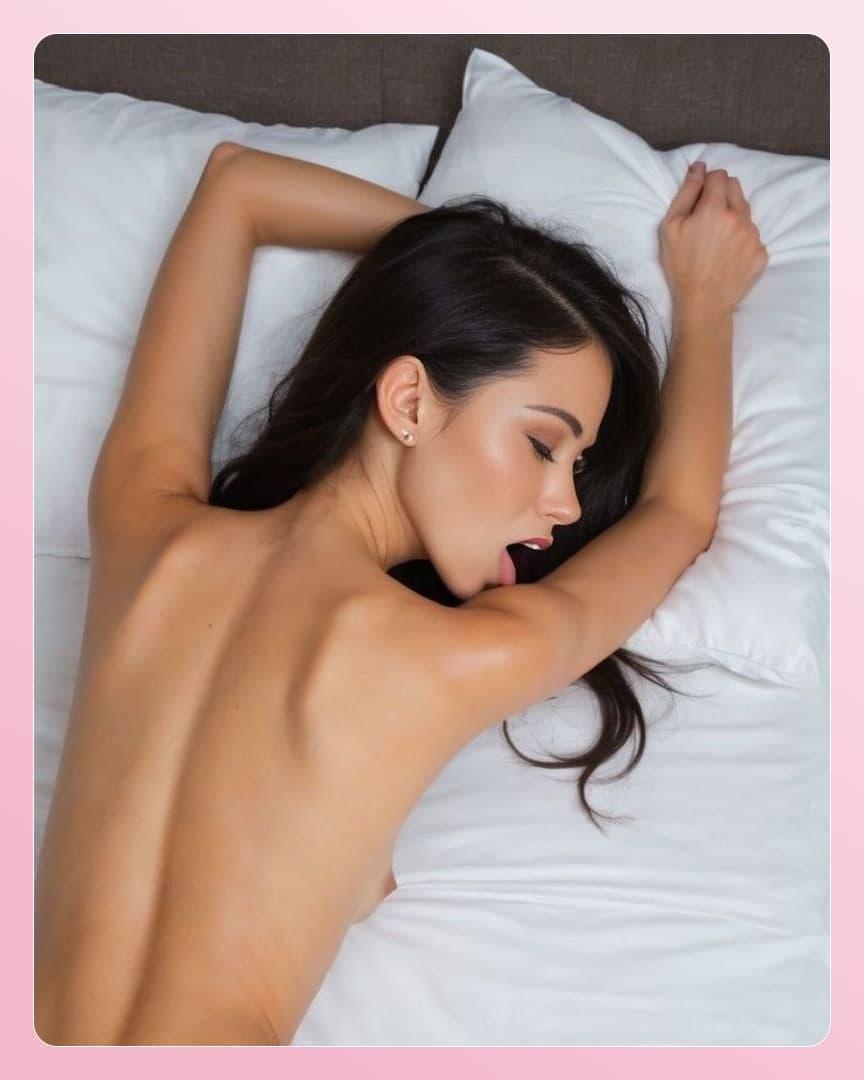 Platinum blonde nude on white sheets