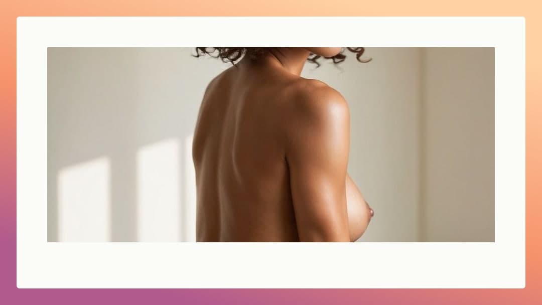 Topless back view by window
