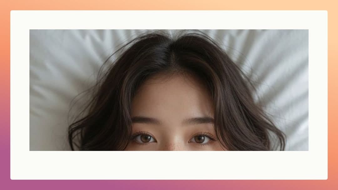 Young Asian in bed close-up