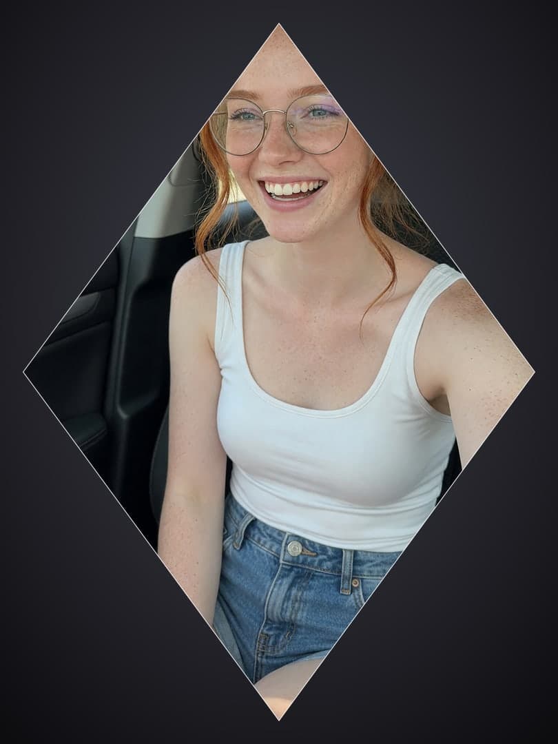 Redhead glasses car selfie