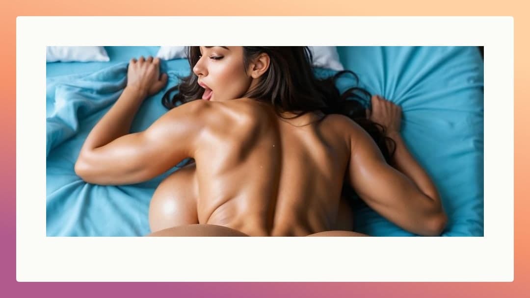 Young Latina prone on blue sheets