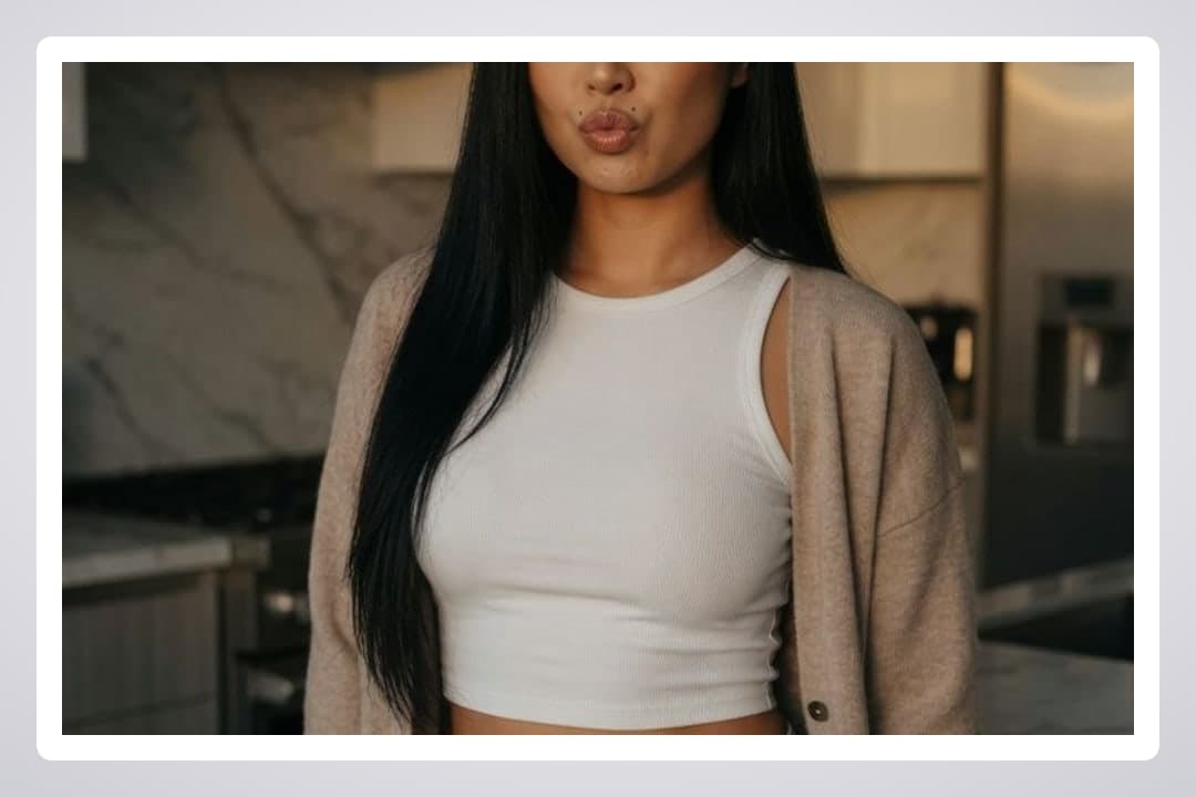 Raven hair kiss pose in kitchen