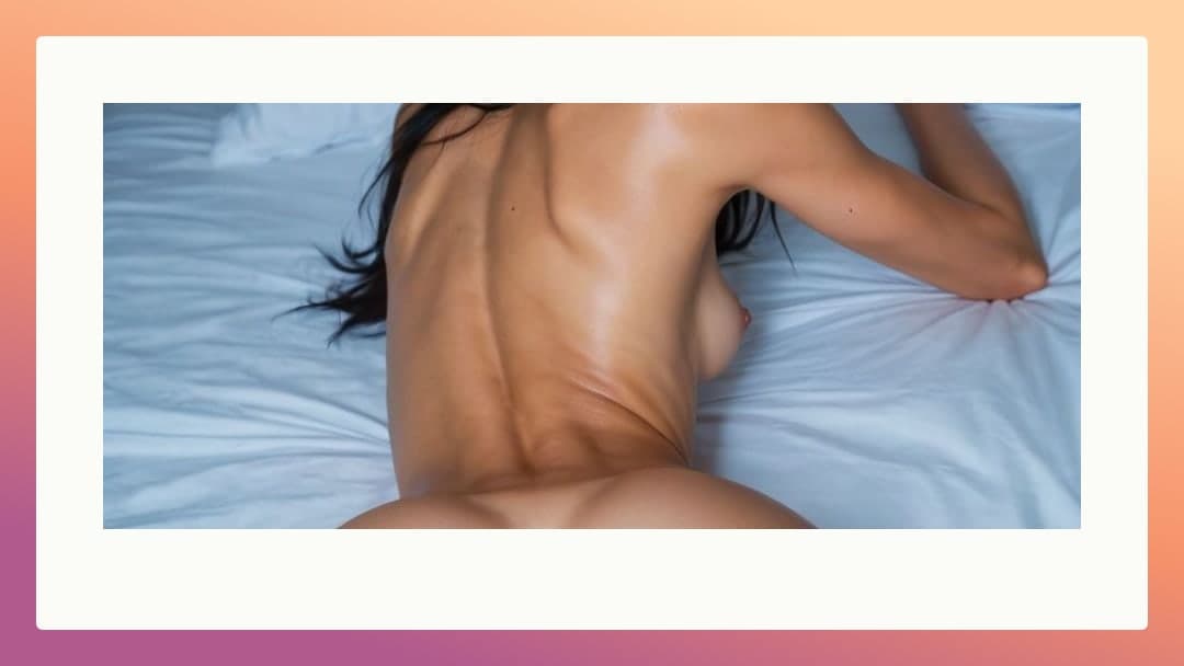 Raven hair nude on white sheets