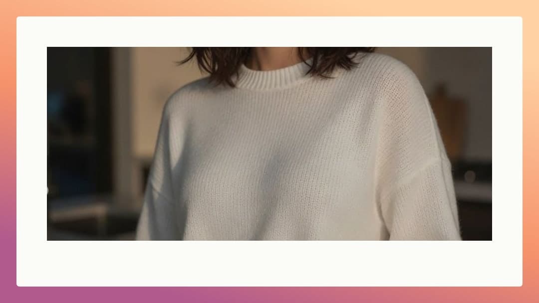 Young adult brunette in white sweater