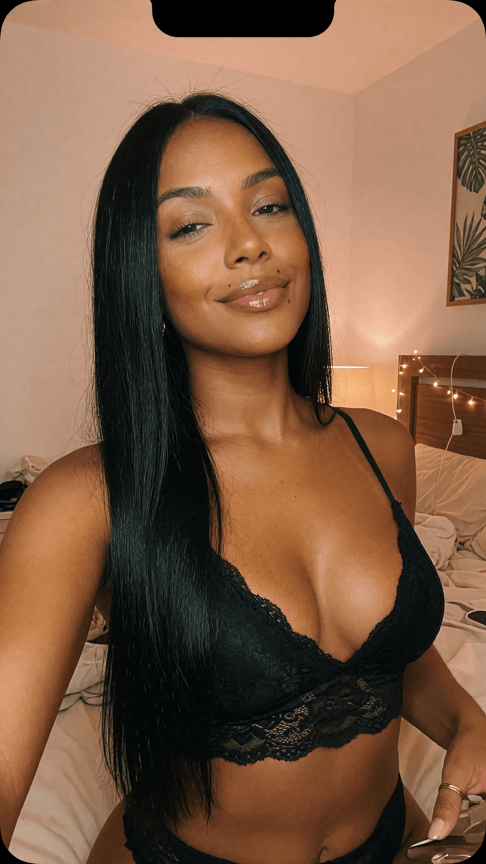 Latina selfie in black lace bra