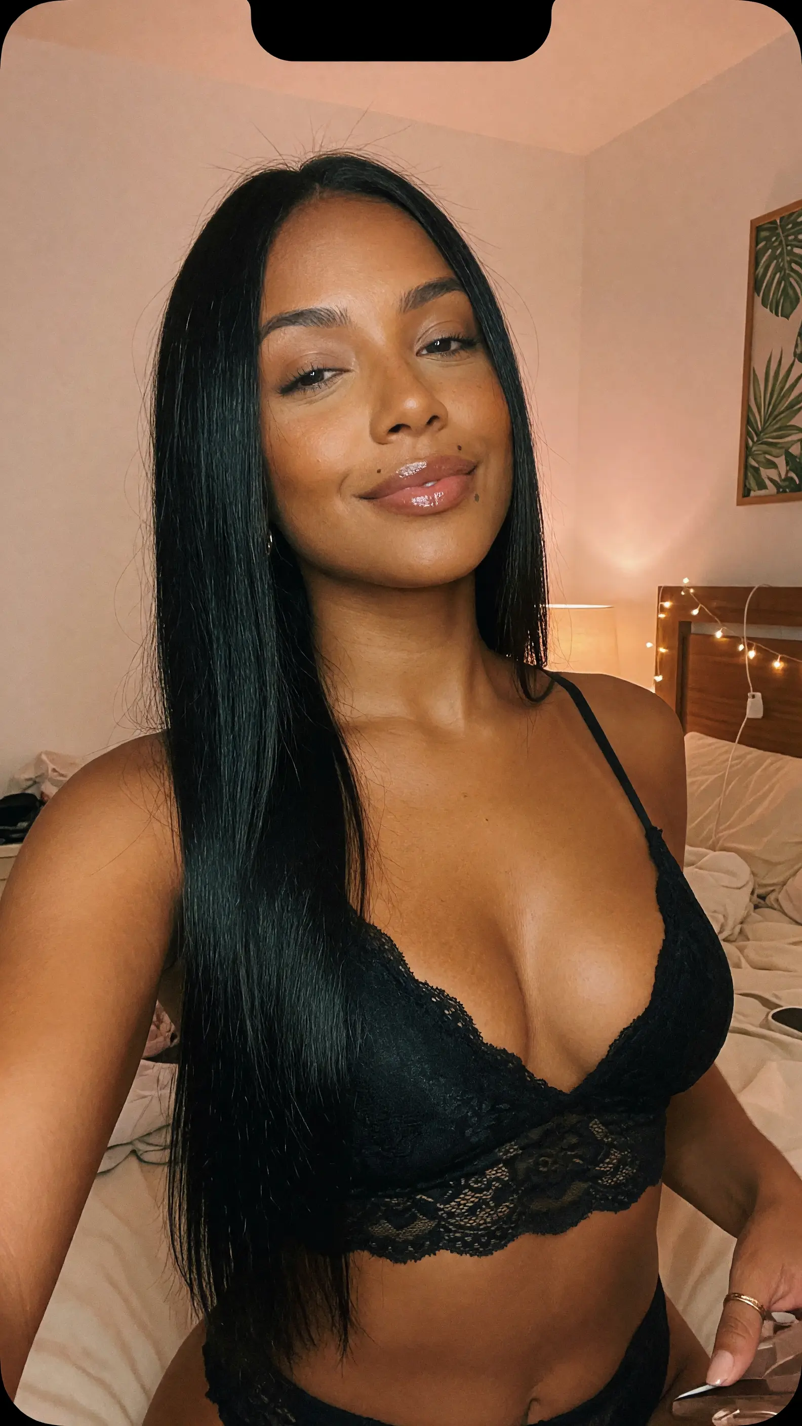 Latina selfie in black lace bra