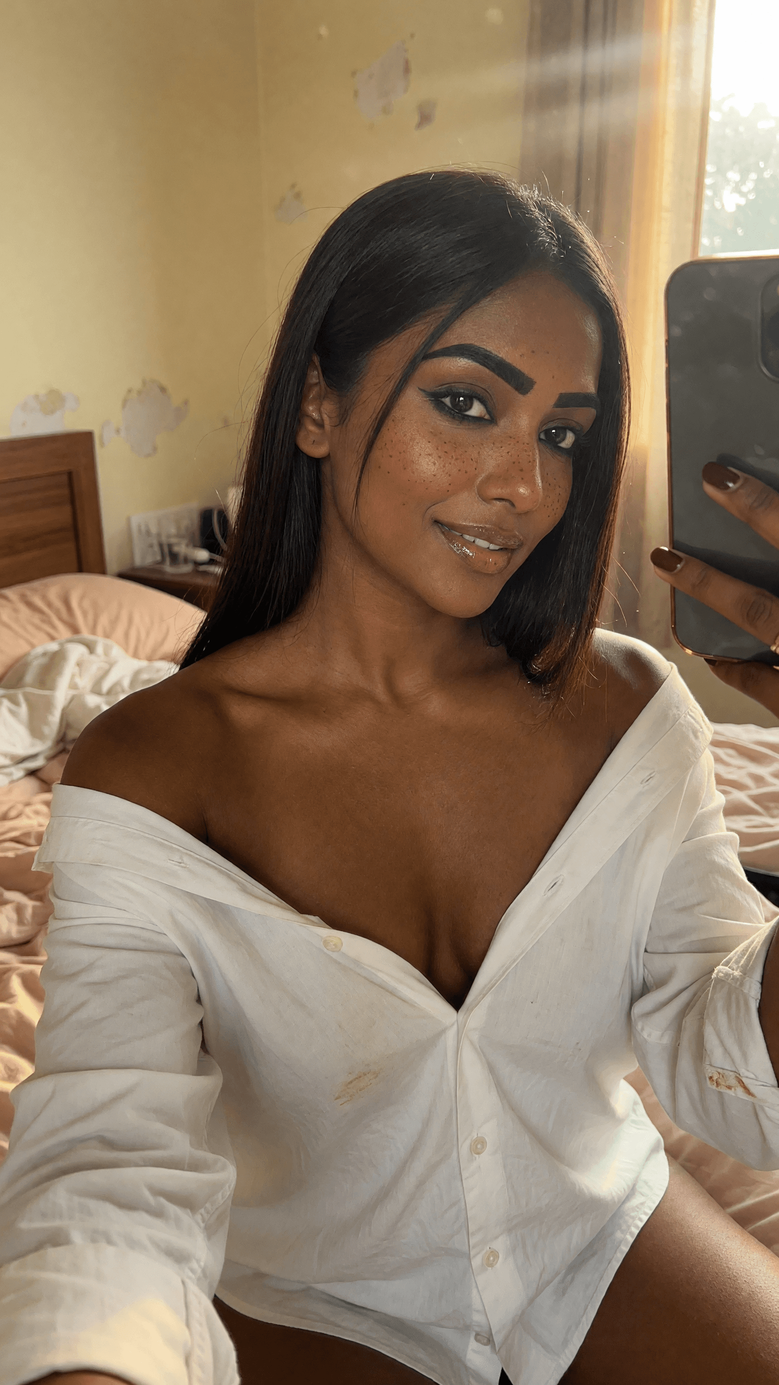 Sunlit bedroom selfie cleavage