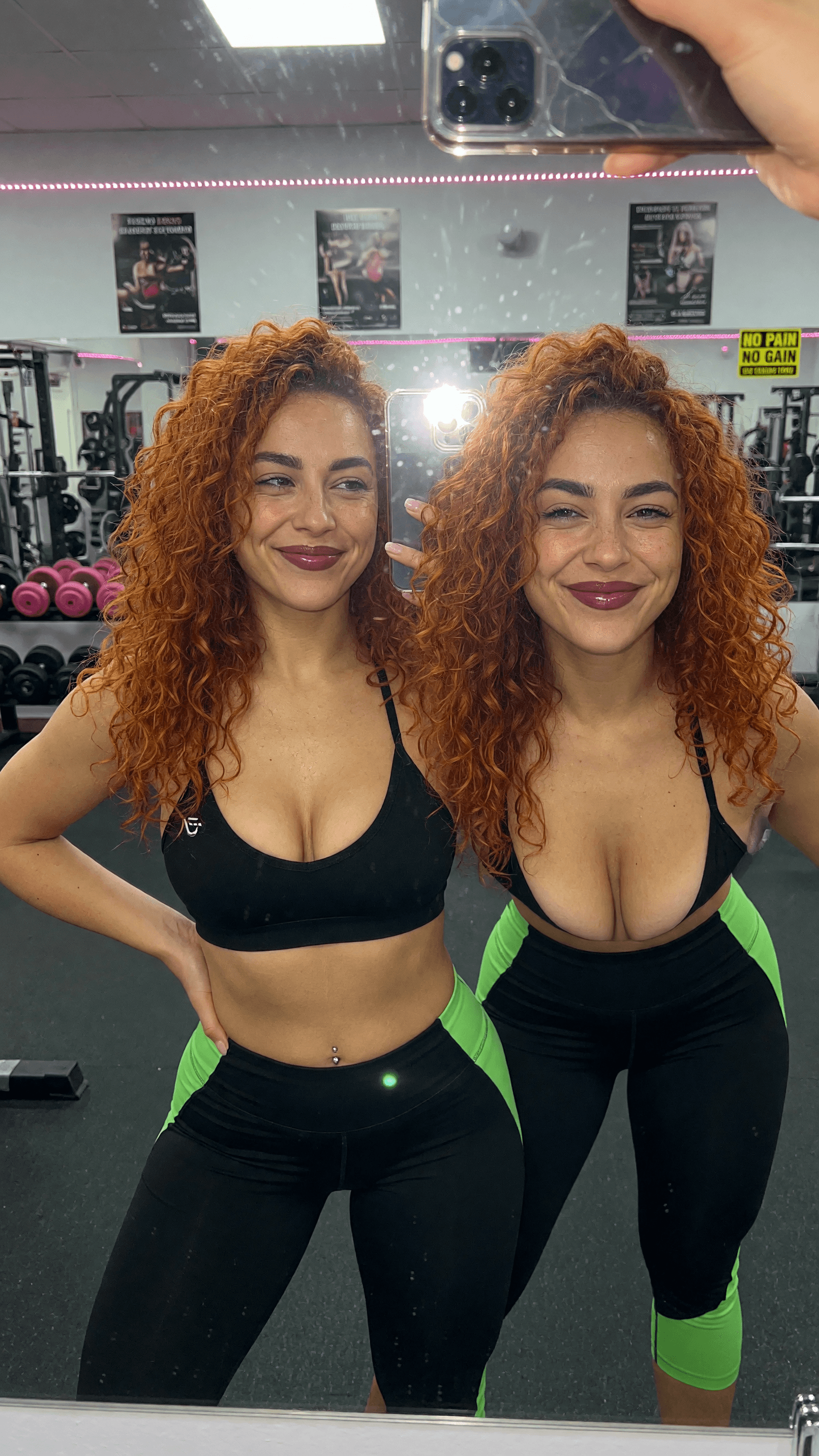 Gym mirror selfie in sports bra