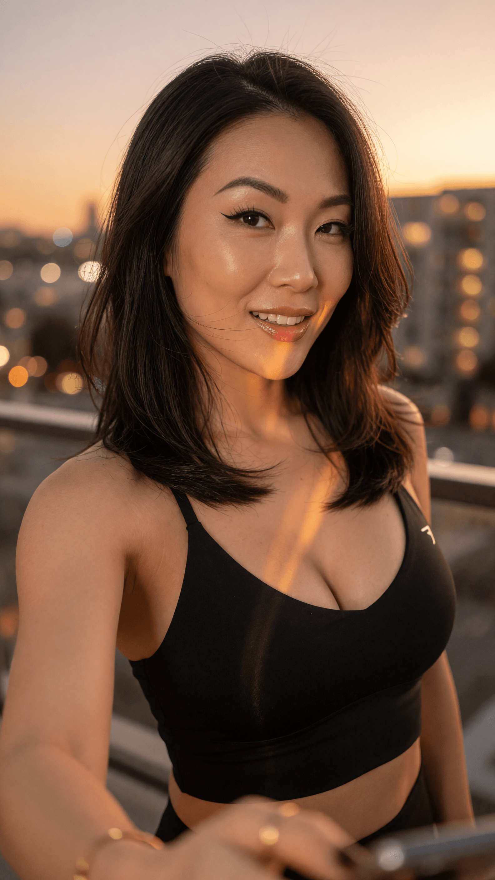 Athletic brunette balcony cleavage selfie
