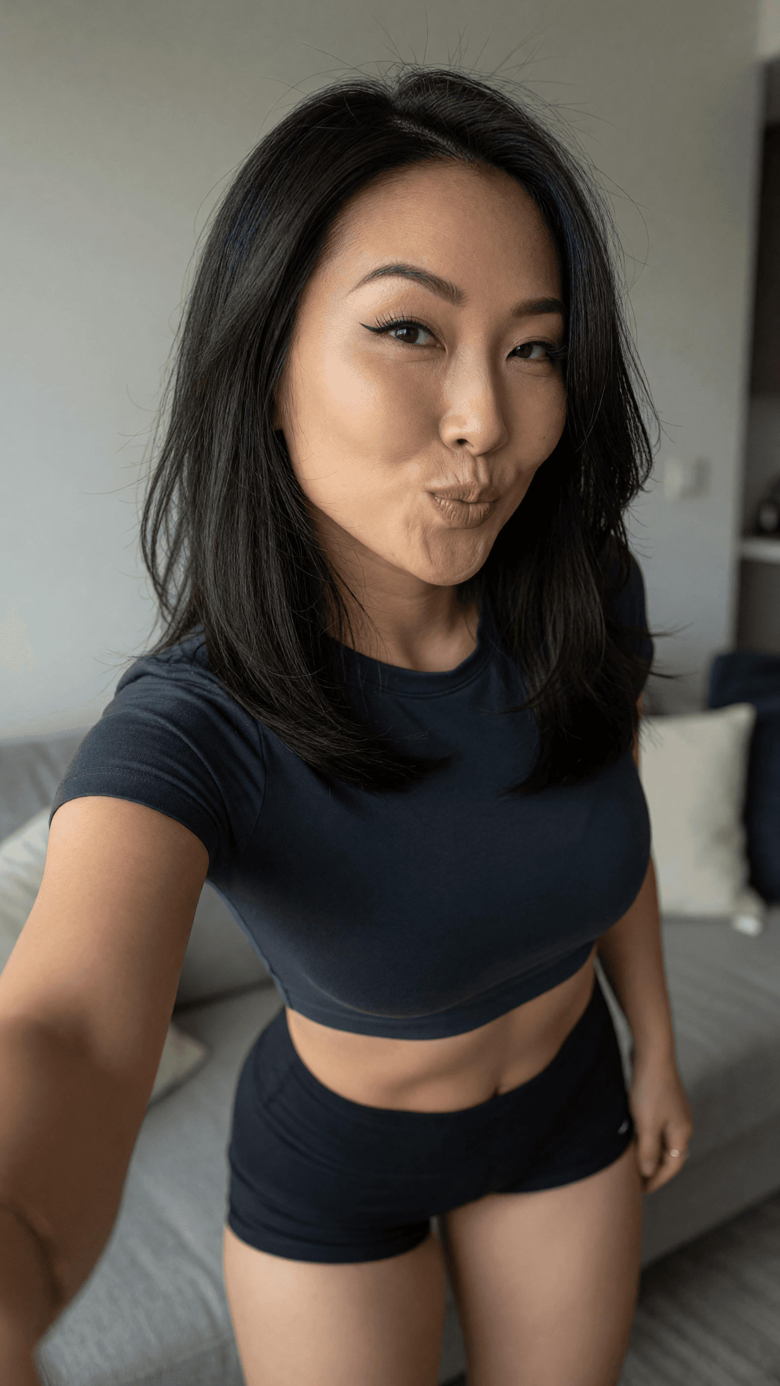 Asian athletic selfie puckered lips