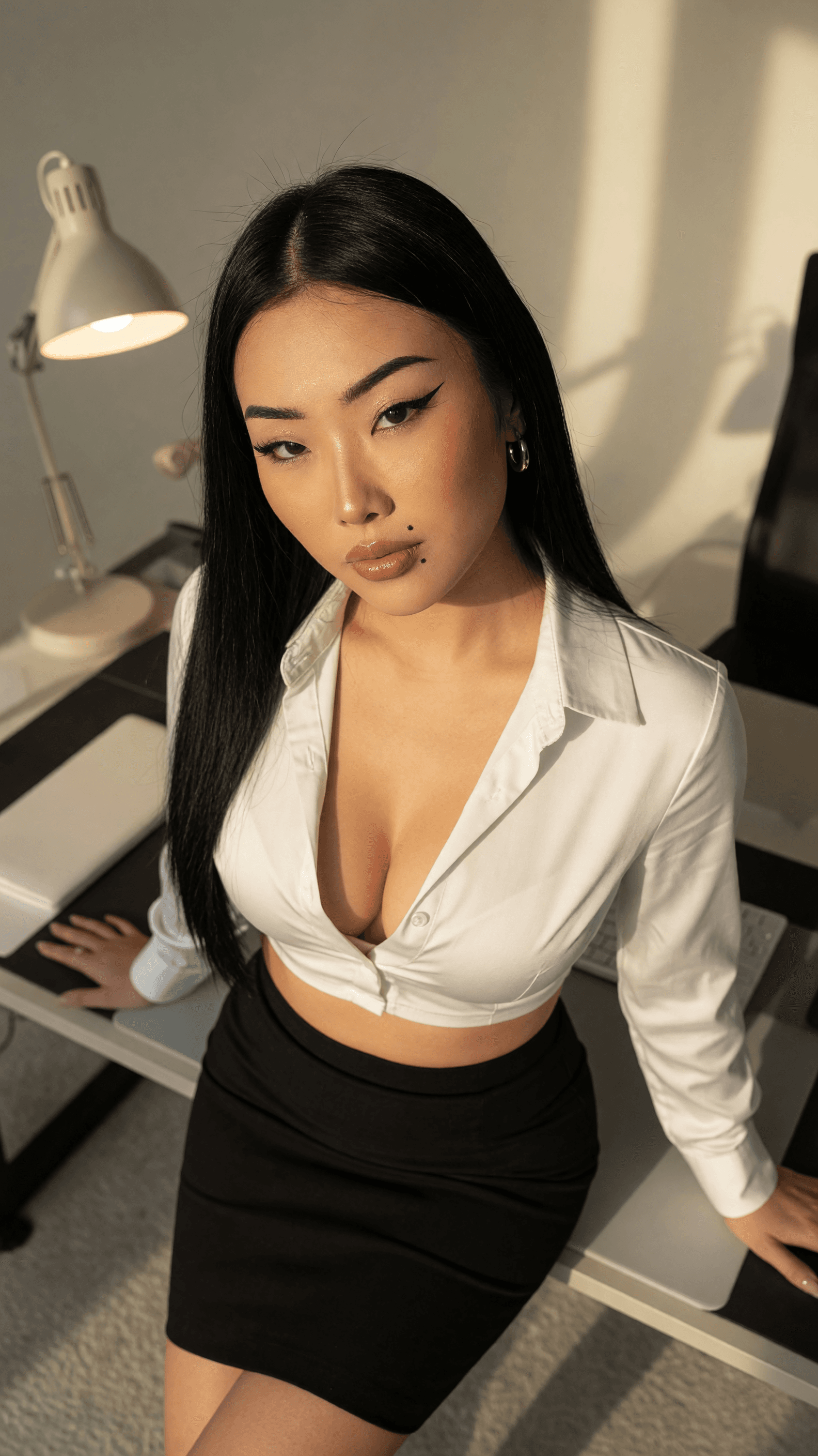 Young receptionist on desk