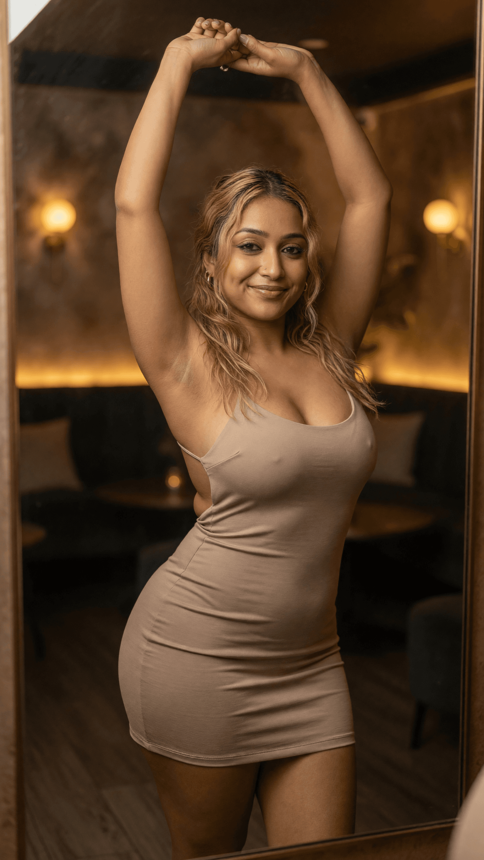 Blonde curvy dress selfie in lounge