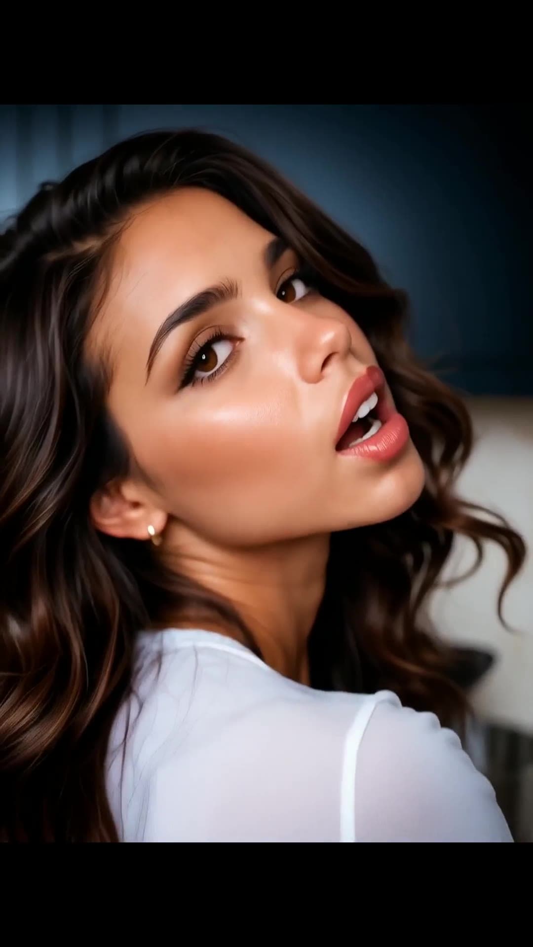 Young adult brunette close-up with glossy lips