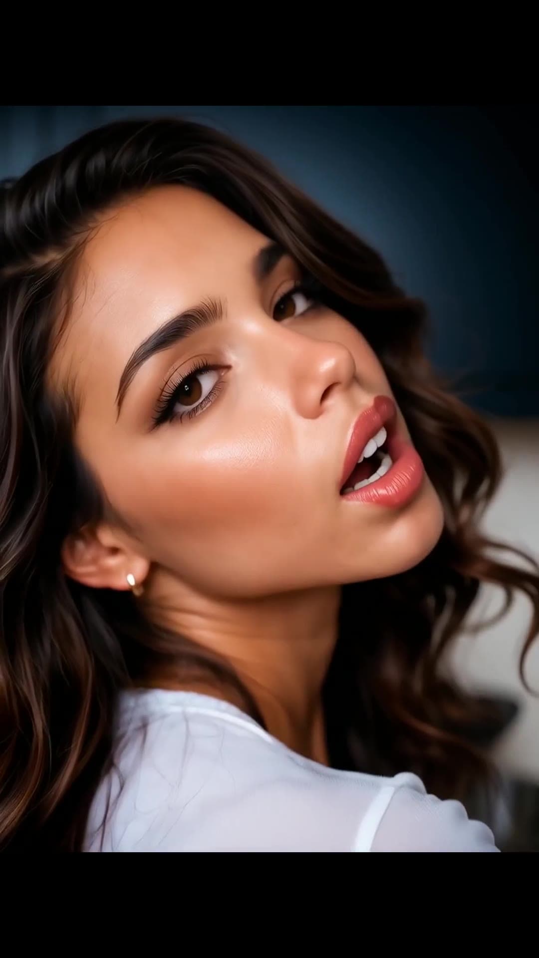 Long wavy brown hair close up, sheer white top