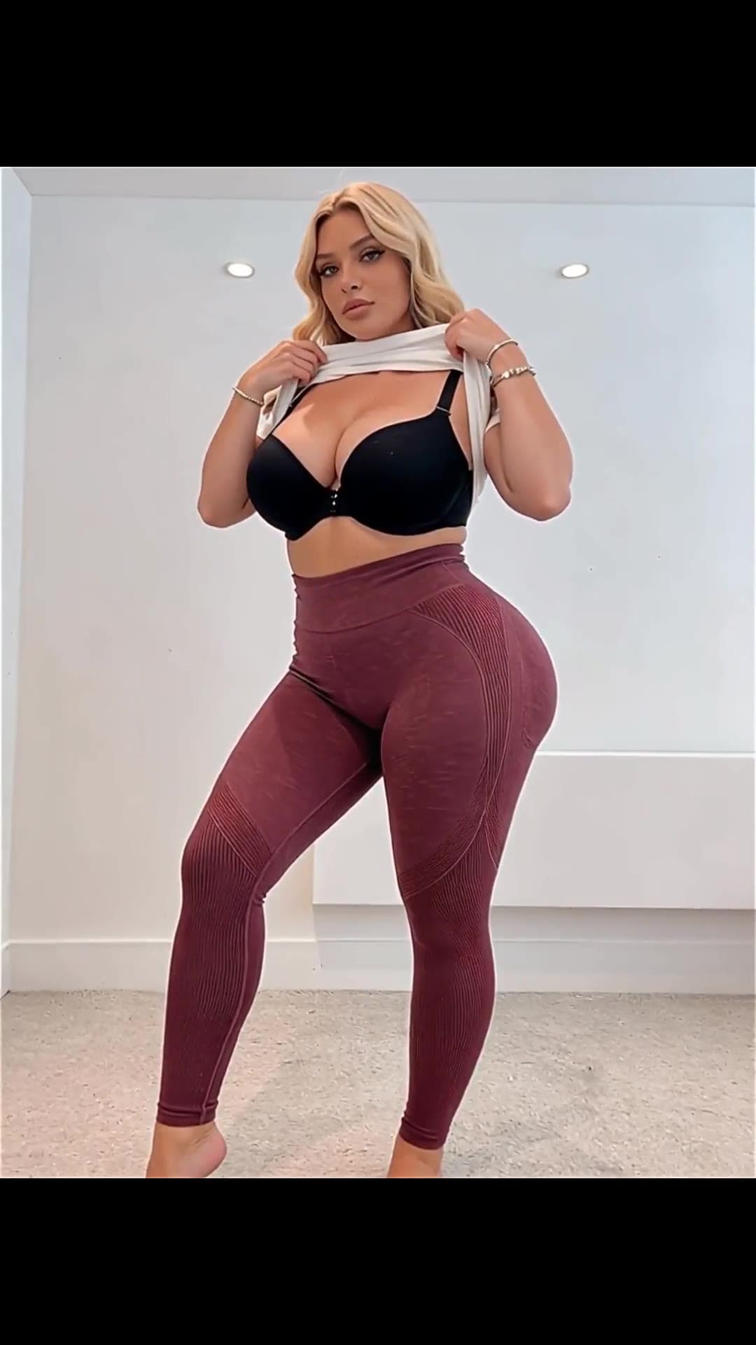 Young adult blonde crop top tease in leggings