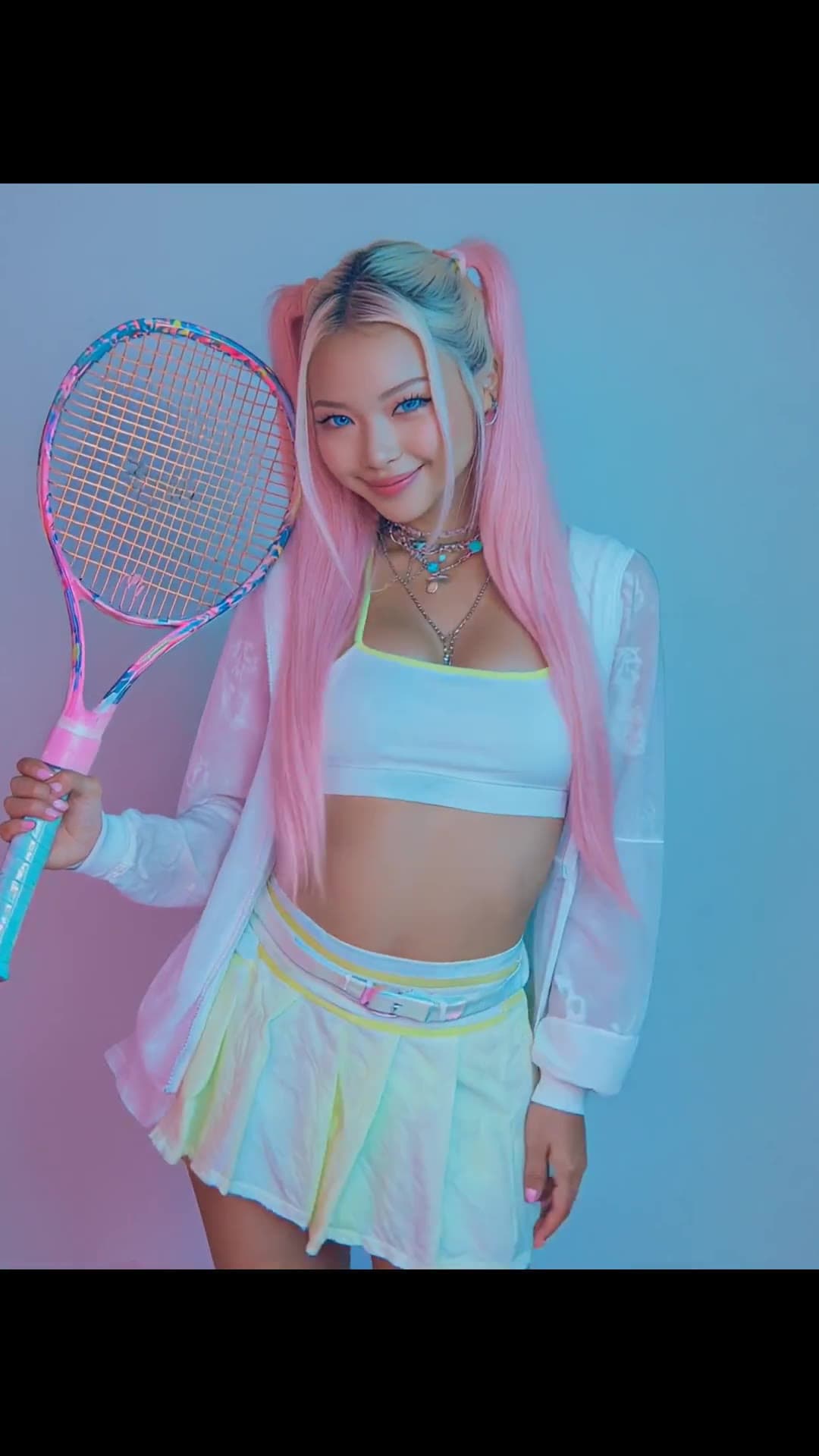 Petite college girl pink pigtails tennis racket